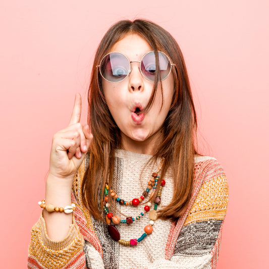 Little hippie girl wearing artisan boho jewelry